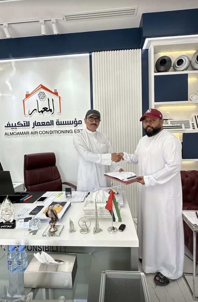 Al Moamar partnership handshake — every project starts with a handshake