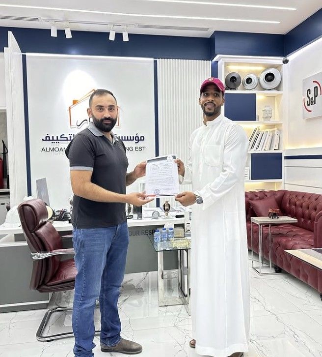Al Moamar partnership handshake — every project starts with a handshake