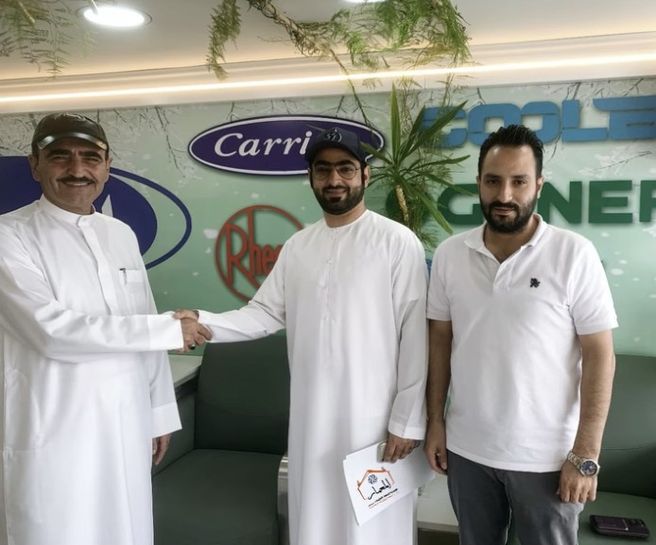 Al Moamar partnership handshake — every project starts with a handshake