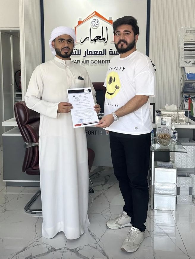 Al Moamar partnership handshake — every project starts with a handshake