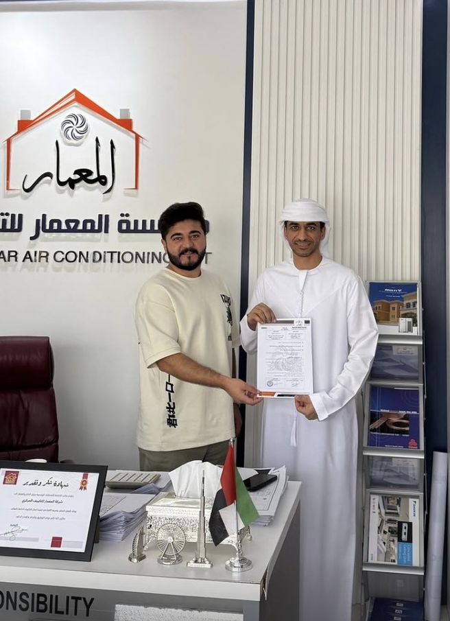 Al Moamar partnership handshake — every project starts with a handshake