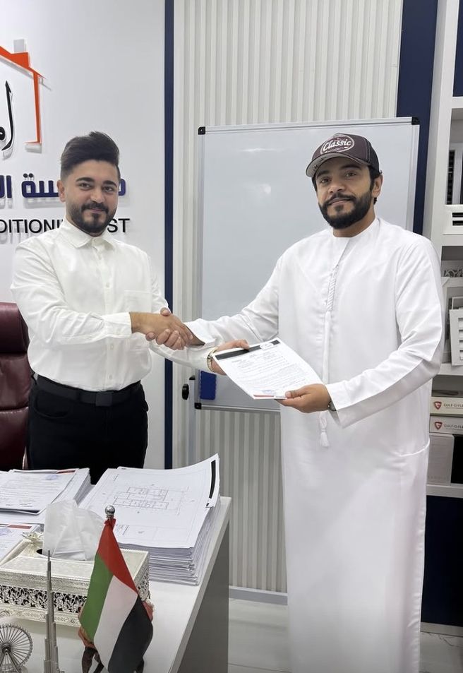 Al Moamar partnership handshake — every project starts with a handshake